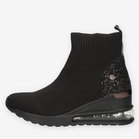 Xti Slip on nere da donna in tessuto con glitter