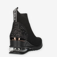 Xti Slip on nere da donna in tessuto con glitter