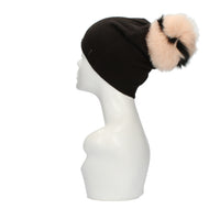 Cappello con pon pon