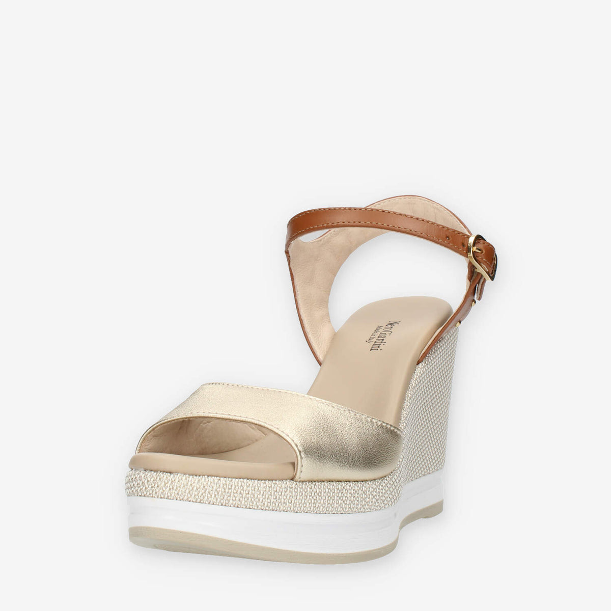 Nero Giardini Sandali oro e cuoio da donna con zeppa glitterata